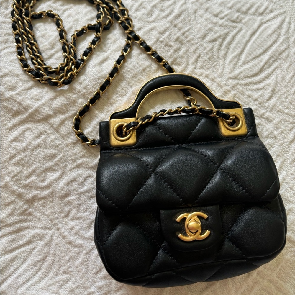 CHANEL authentic Black and Gold Mini Quilted Bag